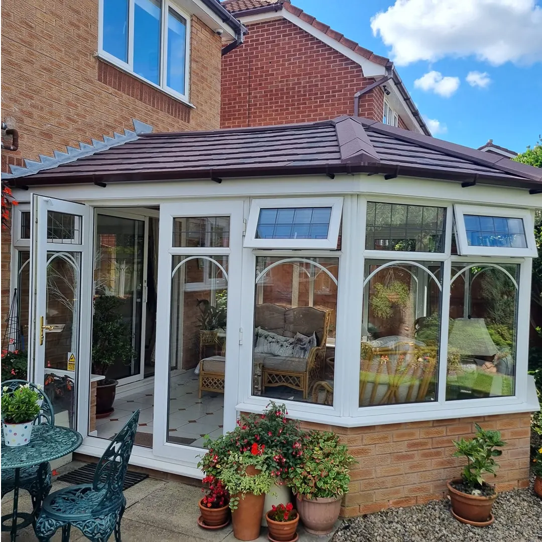 Victorian conservatory with a solid tiled roof